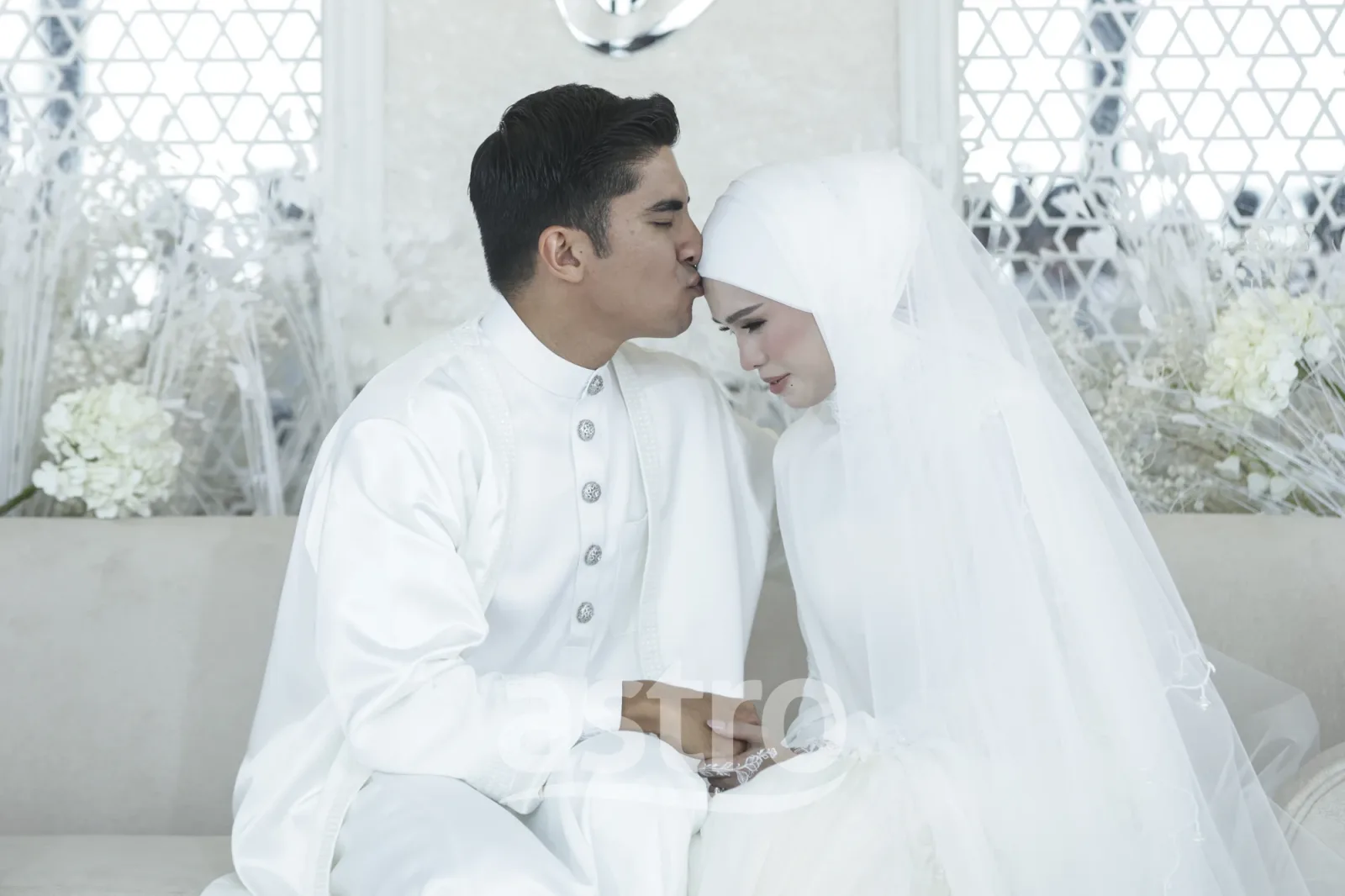 Syed Saddiq dan Bella Astillah selepas akad nikah